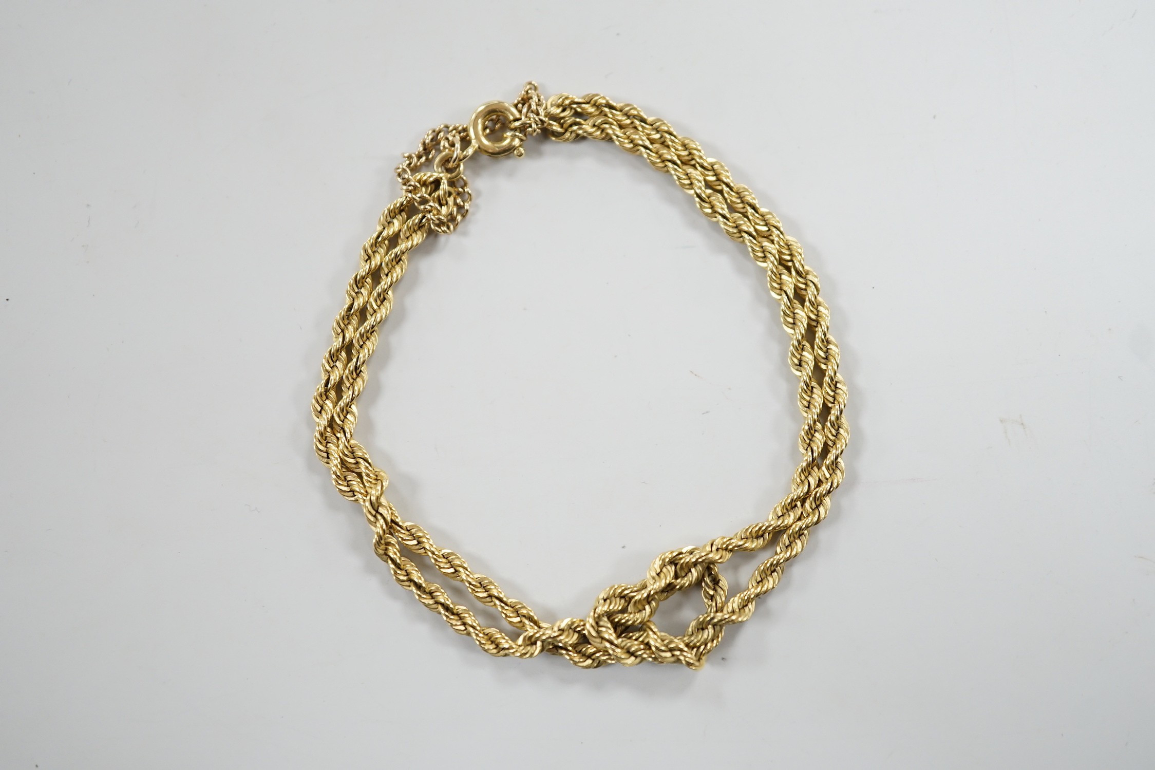 A modern yellow metal twin stand rope twist bracelet, 18cm, 17.4 grams.